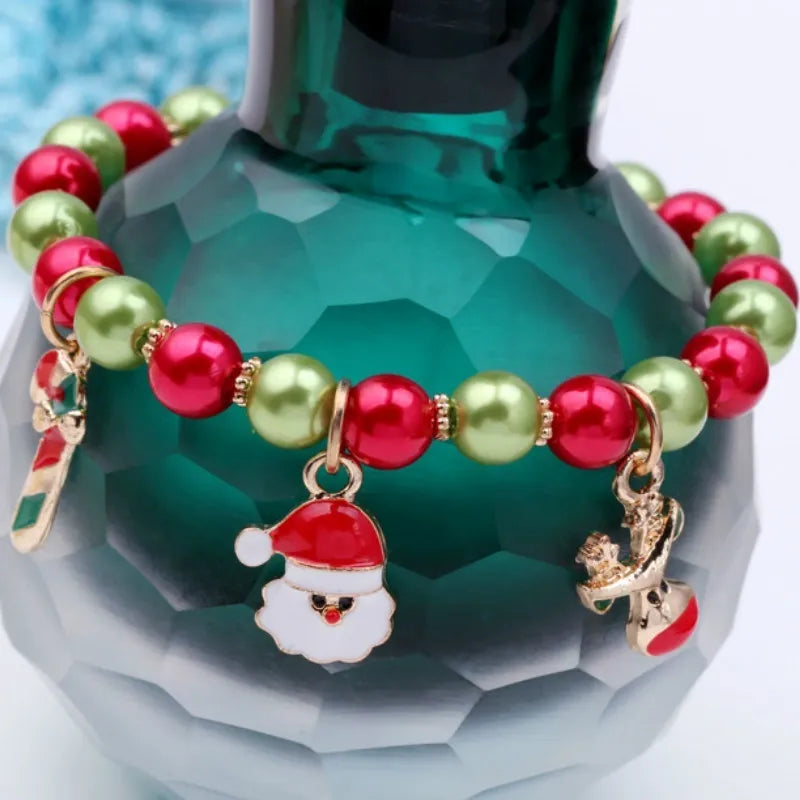 Women's festive Santa bead bracelet, a charming holiday accessory with sparkling beads and a jolly Santa figure.