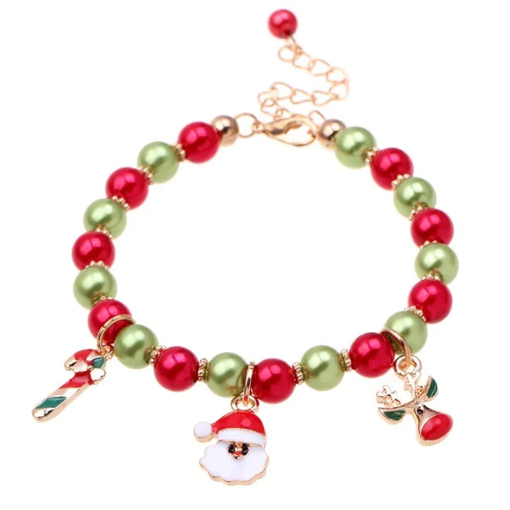 A delightful Santa charm bracelet for women, featuring red & green festive beads, ideal for Christmas holiday wear.