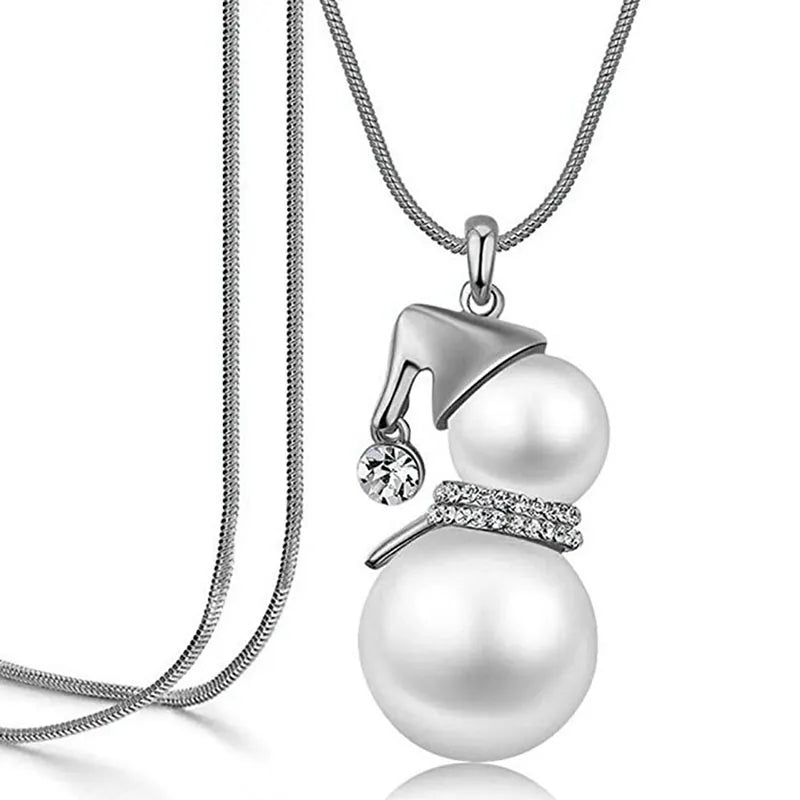 Elegant Christmas snowman pearl necklace, featuring a cute snowman charm and lustrous pearls.