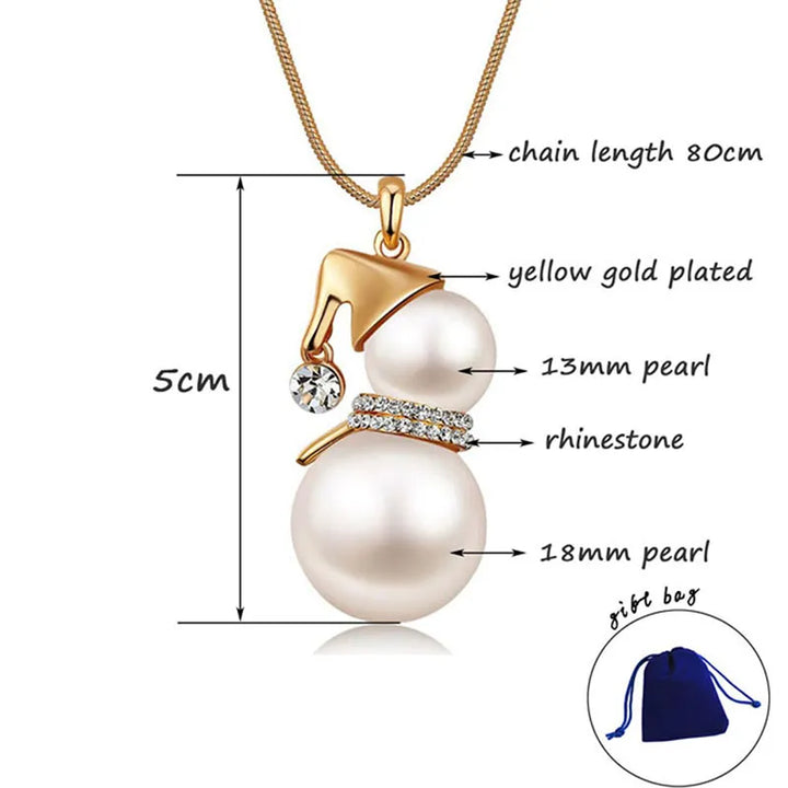 Beautiful gold & silver Christmas snowman pearl necklace. A festive holiday accessory for women.