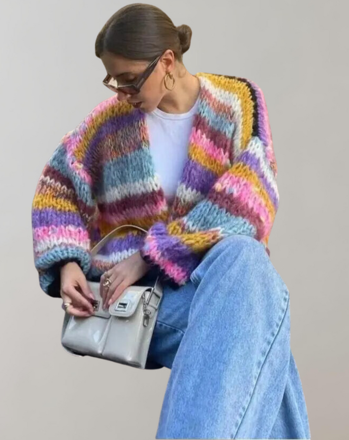 Close-up of the textured knit on a women's chunky Lotta cardigan, showing its cozy acrylic wool
