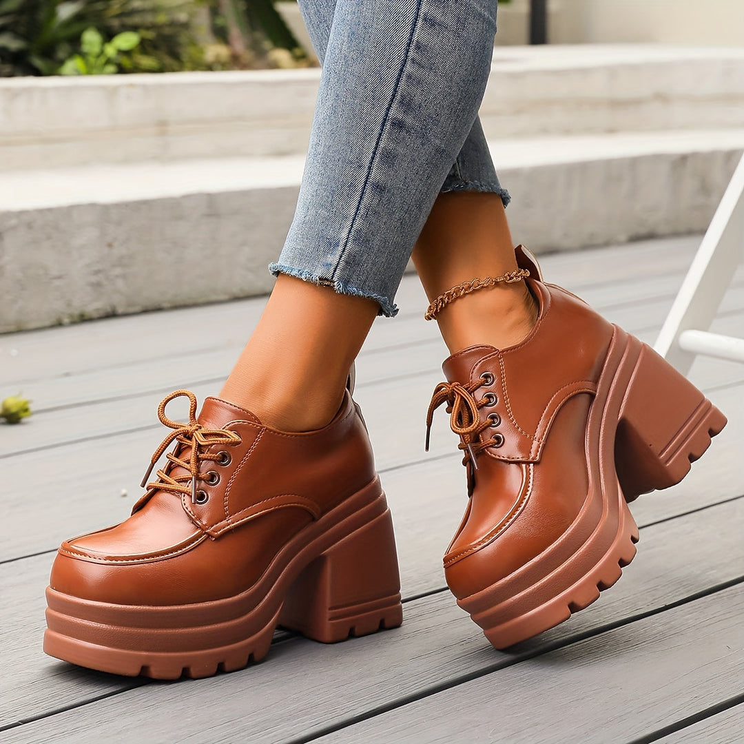 Women's chunky platform oxfords with lace-up detail, perfect for retro fashion and elevated style.