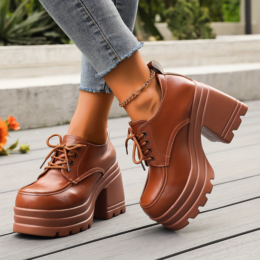 Stylish women's lace-up platform oxfords, versatile as dress or casual retro shoes with comfort.