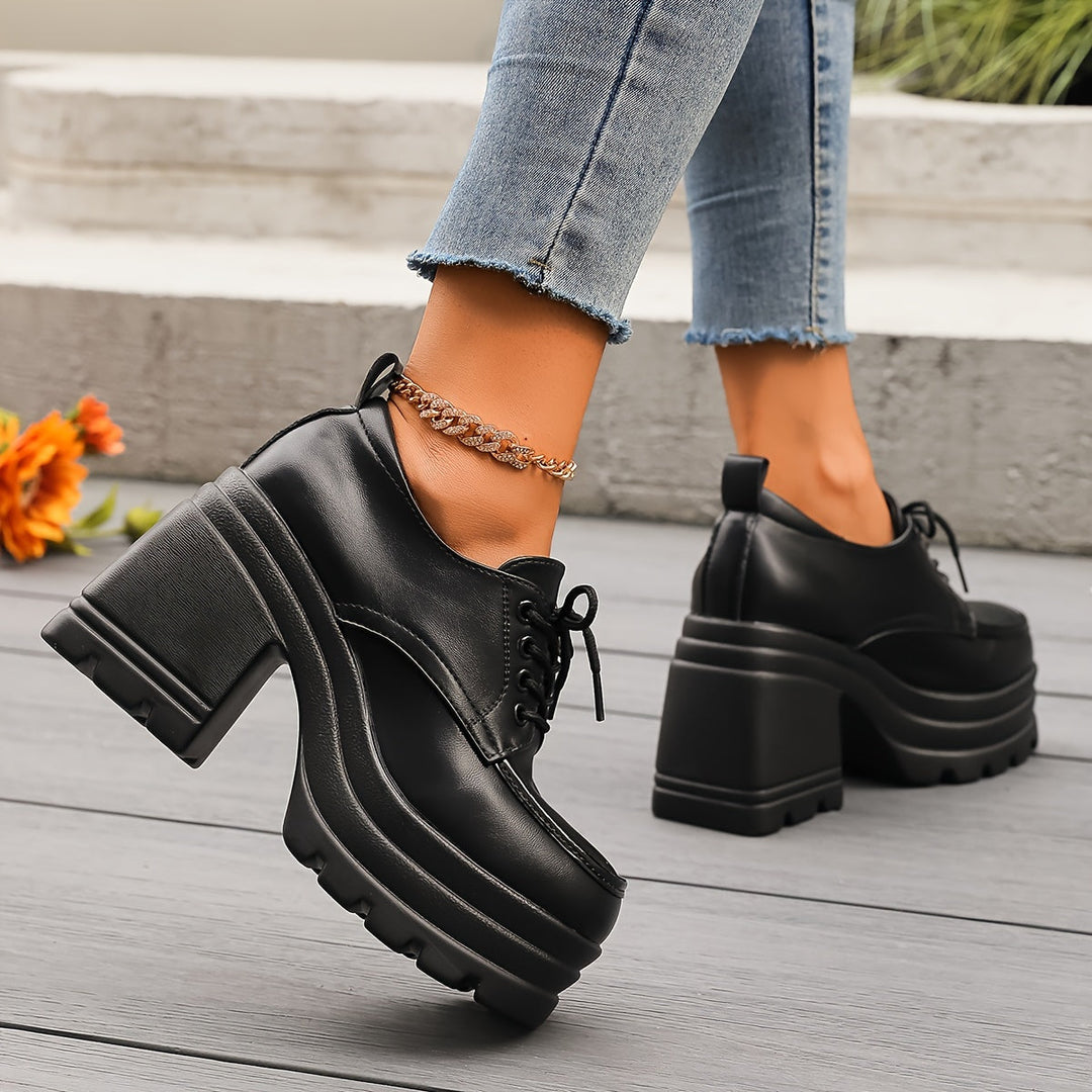 Elegant women's chunky platform oxfords, providing an elevated, stylish, and comfortable retro footwear option.