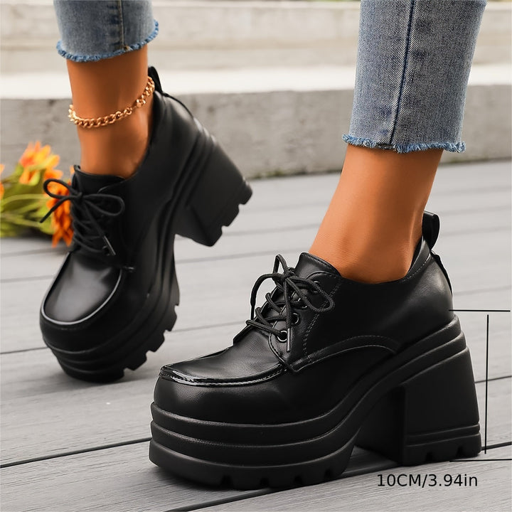 Comfortable and stylish women's chunky platform lace-up oxfords, great for a retro-inspired or modern look.