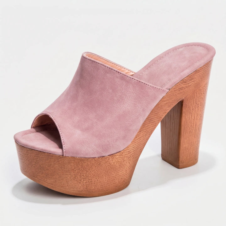 Comfortable women's slip-on platform sandals with a chunky block heel for versatile summer casual & dressy wear.