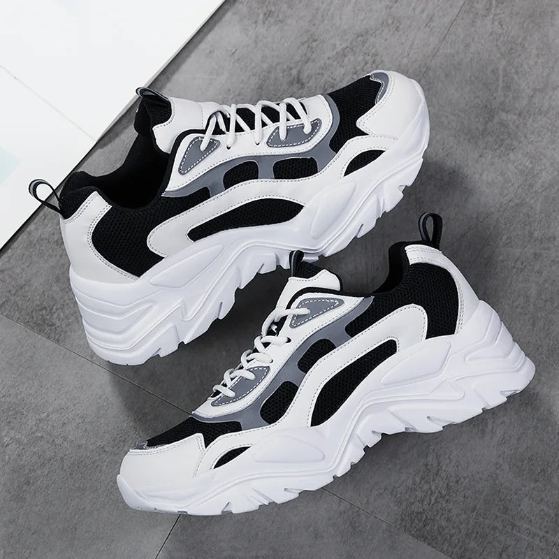 Casual women's chunky platform sneakers, mesh details, offering comfort & elevated style for everyday wear.