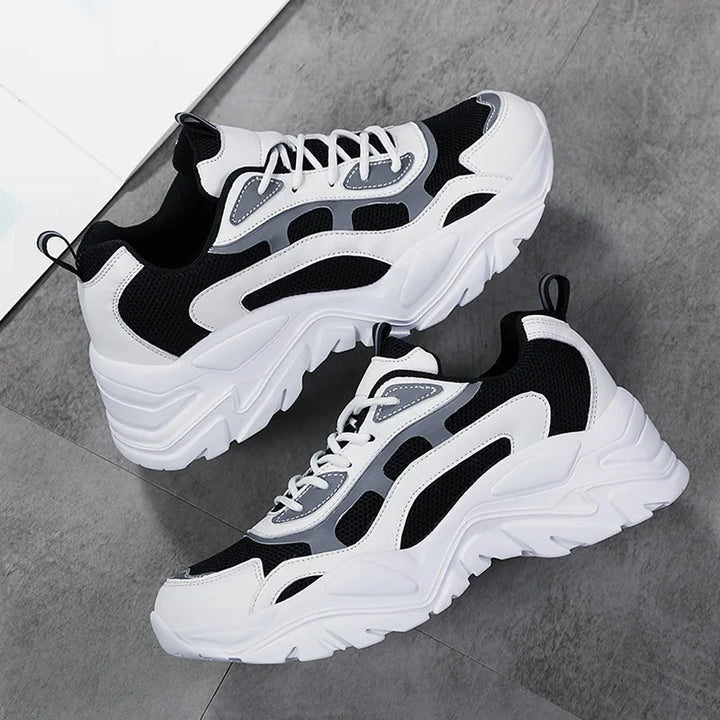 Casual women's chunky platform sneakers, mesh details, offering comfort & elevated style for everyday wear.