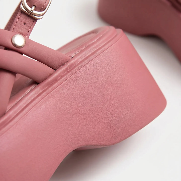 Open-toe women's chunky platform wedge sandals with an adjustable ankle strap for elevated summer footwear.