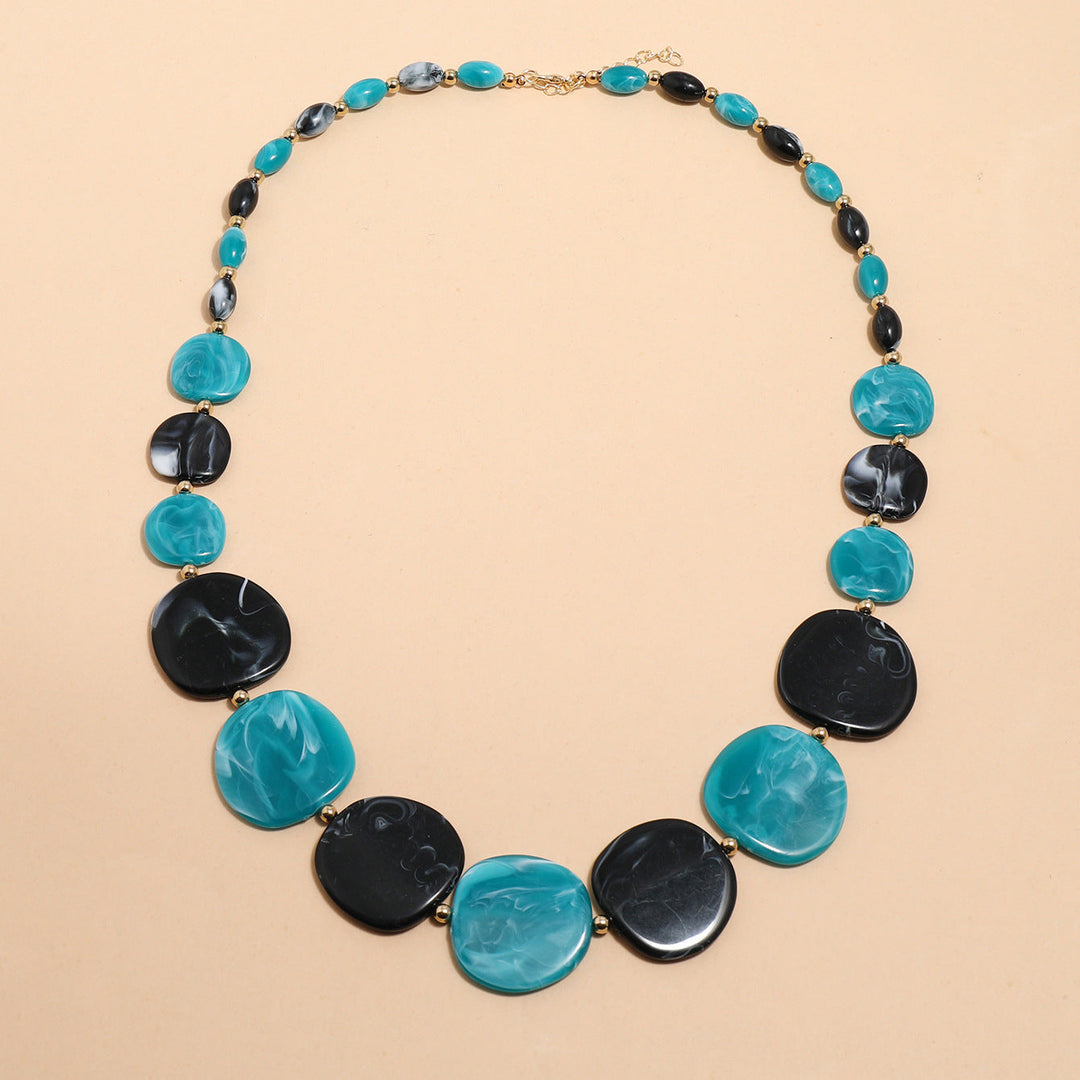 Women's chunky wooden bead statement necklace. Large, natural, earthy, bohemian style accessory for fashion.