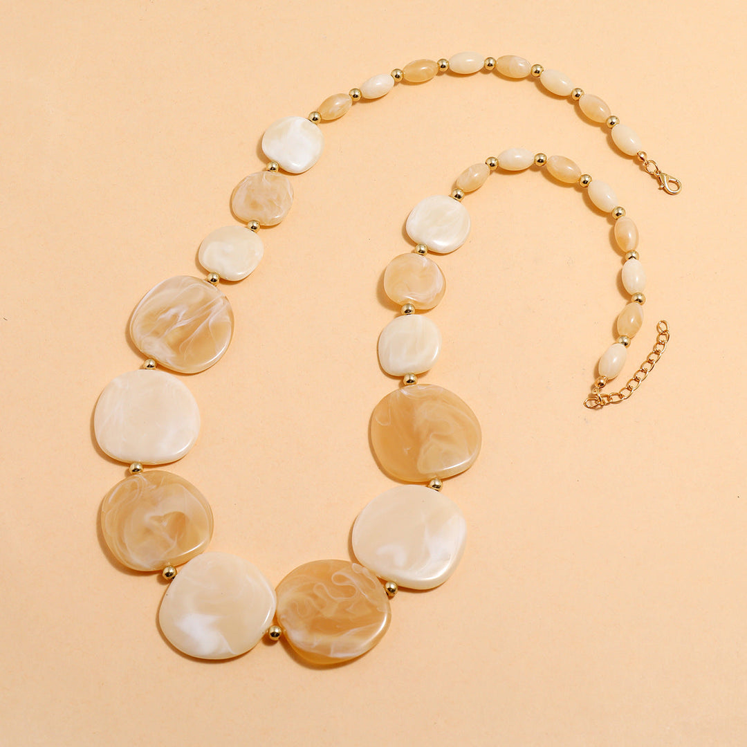 Handmade look women's large chunky wooden bead necklace. Natural, eco-friendly, bohemian statement jewelry.