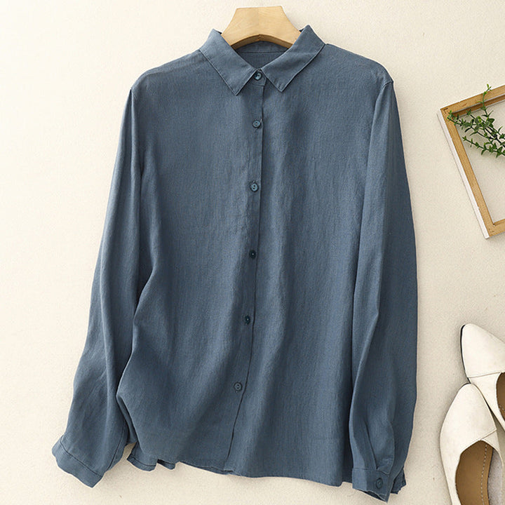 Elegant women's Clara button-down shirt with long sleeves. A versatile top for casual outings or chic events.