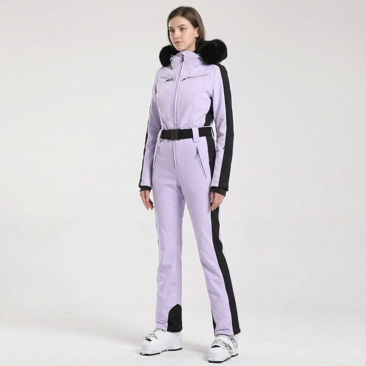 Stylish Clarissa one-piece ski suit, waterproof, insulated, and hooded for cold weather sports.