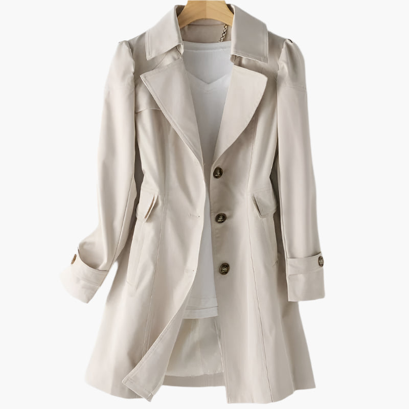 Close-up of a women's classic trench coat, highlighting the tailored fit & quality fabric. Timeless style outerwear.