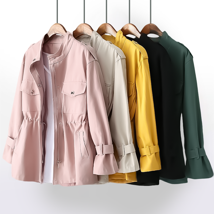 Fashionable women's structured trench coat, a classic belted style with notch collar. Essential elegant workwear.