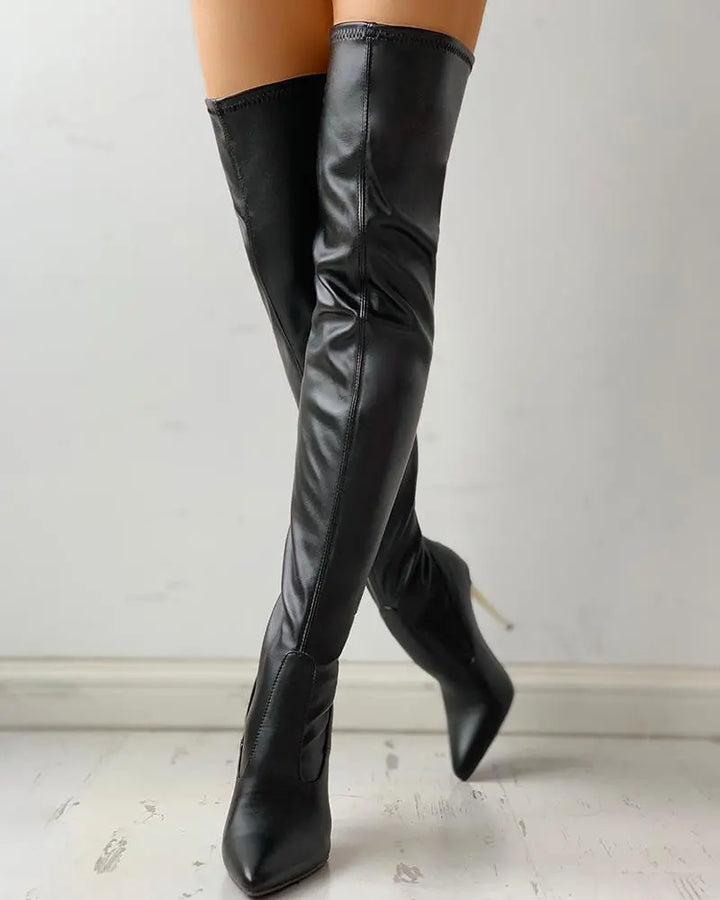 Women's classic black knee-high boots with a comfortable low heel & full zip. Perfect for versatile fall fashion.