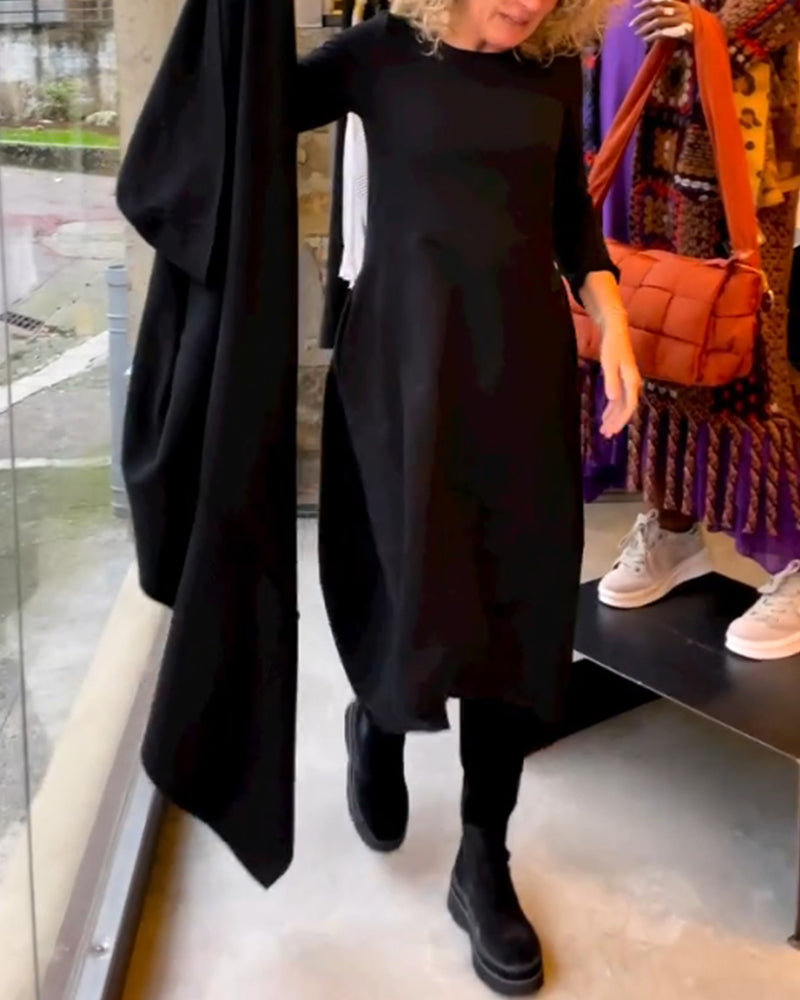 Women's Classic Black Midi Dress with long sleeves, round neck, and A-line skirt. Timeless elegance for any season.