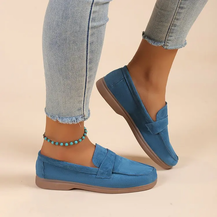 Women's classic comfortable loafers, designed for easy slip-on and walking comfort.