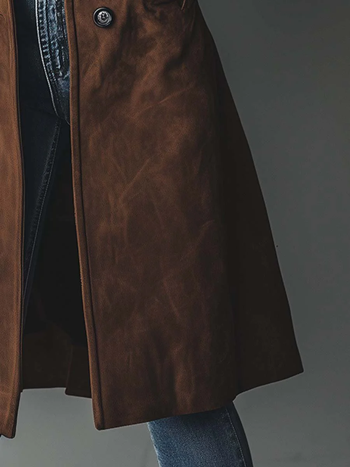 Timeless women's vintage style brown trench coat. Elegant long outerwear, perfect for classic fall fashion.