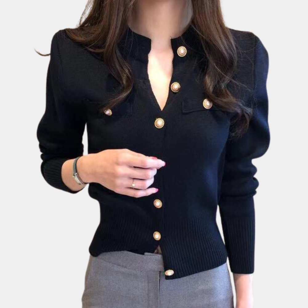 Women's classic button-front cardigan. Cozy knitwear perfect for versatile layering, a stylish long-sleeve top.