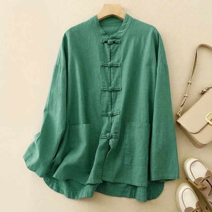 Elegant women's classic button-front shirt, perfect for casual wear, with stylish knot closures & long sleeves.