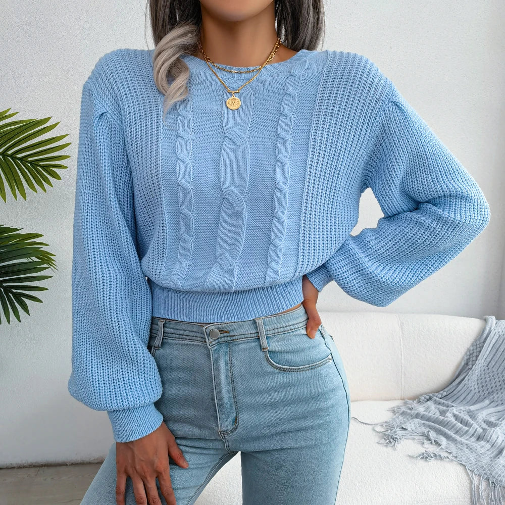 Women's sky blue cable knit sweater. Soft, cozy & relaxed fit, a casual essential for winter fashion.