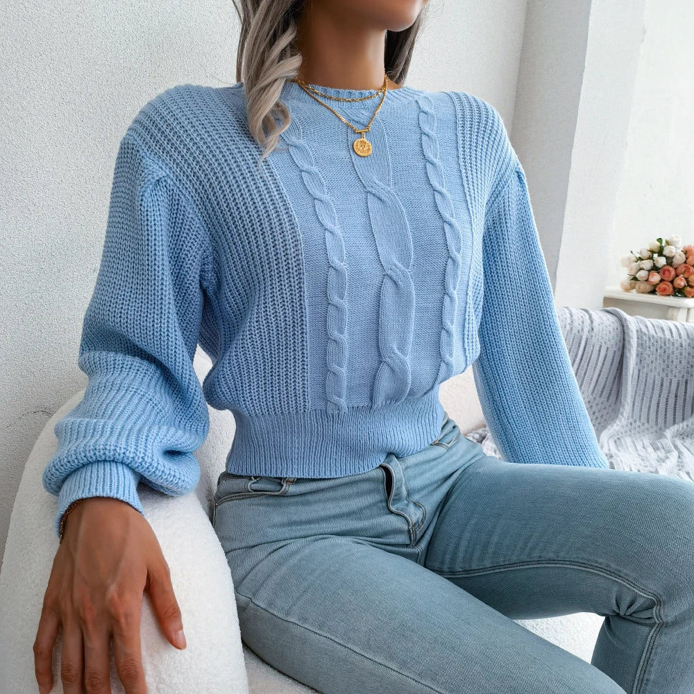 Khaki women's oversized knit sweater with classic cable texture. Cozy & stylish for winter casual wear.