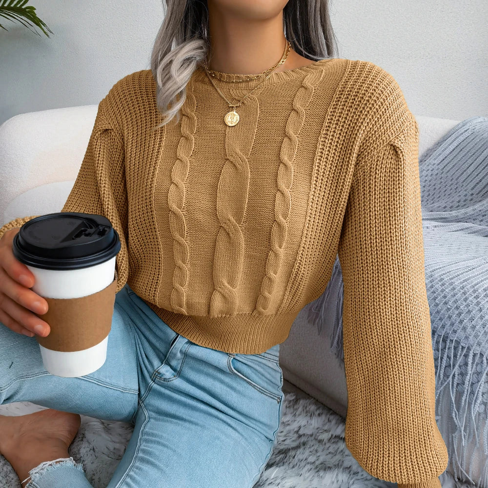 Relaxed fit women's cable knit sweater. Oversized and cozy, available in yellow, sky blue, khaki.