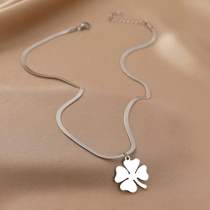 Elegant sterling silver clover pendant necklace, a delicate fashion accessory and perfect gift for her.