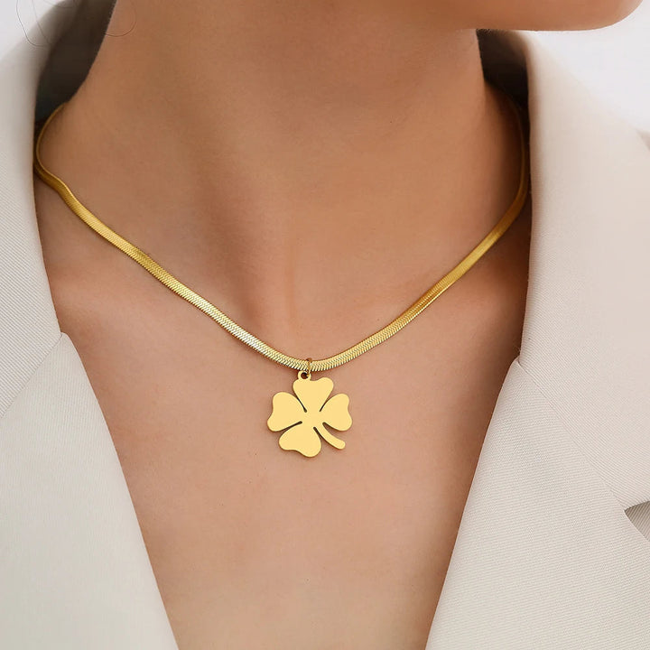 Timeless women's gold plated clover pendant necklace, a versatile and elegant fashion accessory.