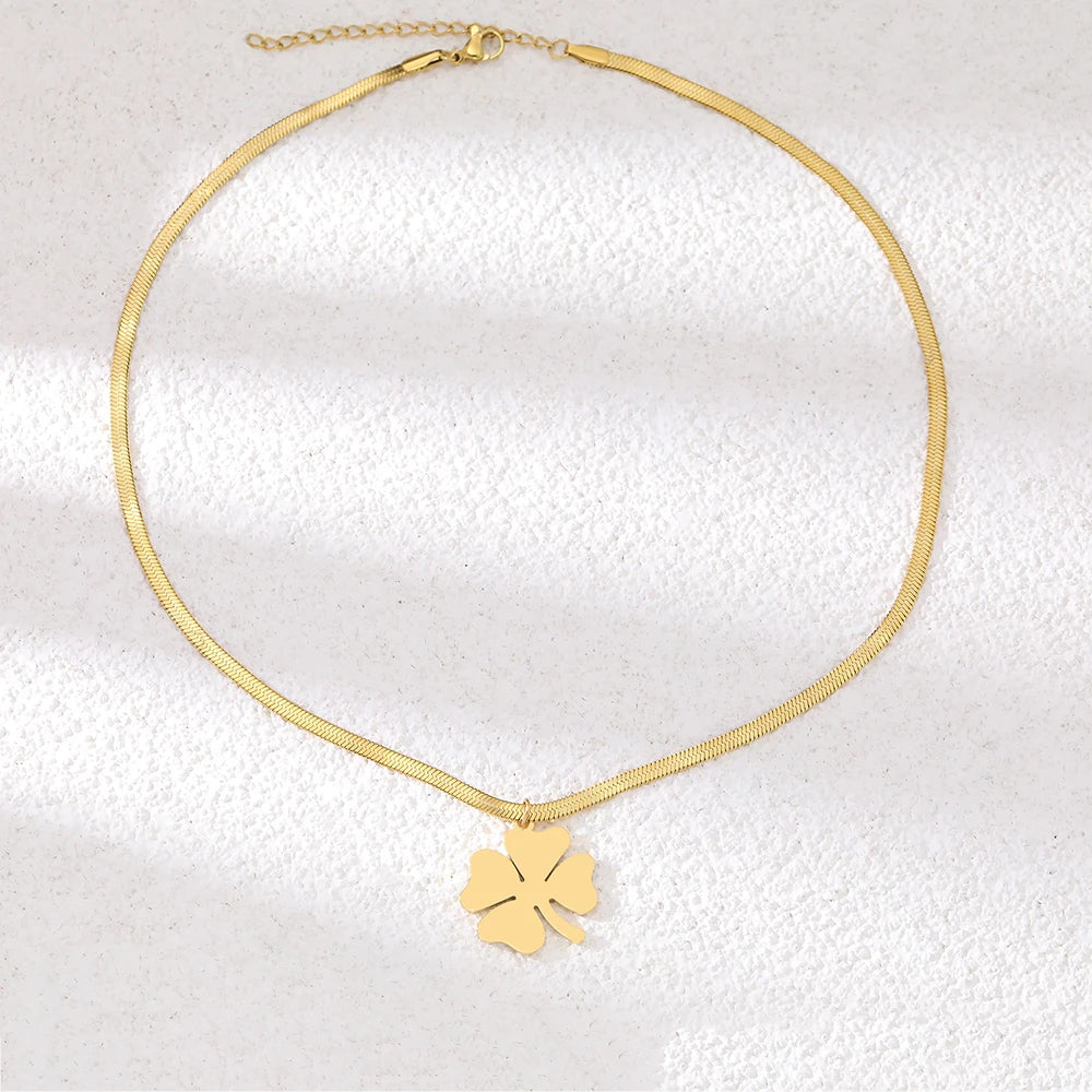 Elegant gold plated clover pendant necklace for women, a delicate and classic gift or fashion accessory.