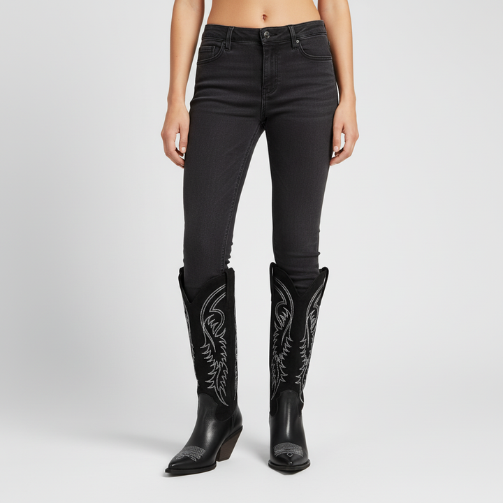 Comfortable women's cowboy boots with Western detailing, a classic footwear choice for all seasons.