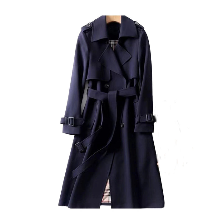 Stylish woman wearing a classic trench coat. Versatile, elegant outerwear for all-season fashion and sophisticated style.