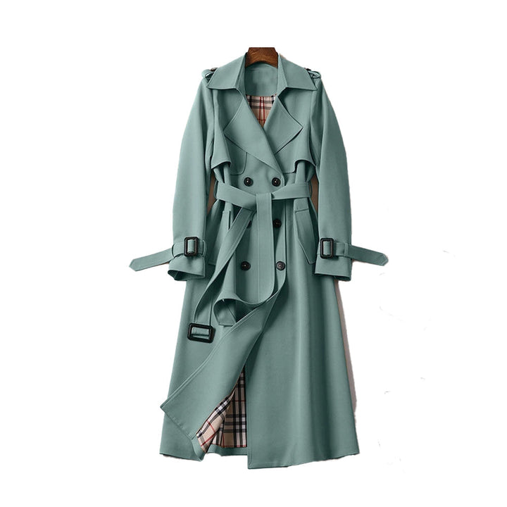 Back view: Women's classic trench coat, showcasing double-breasted design & elegant, sophisticated outerwear style.