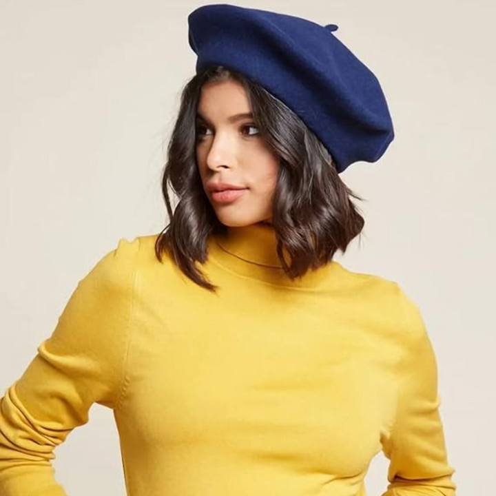 Versatile women's wool beret, suitable for various winter looks.