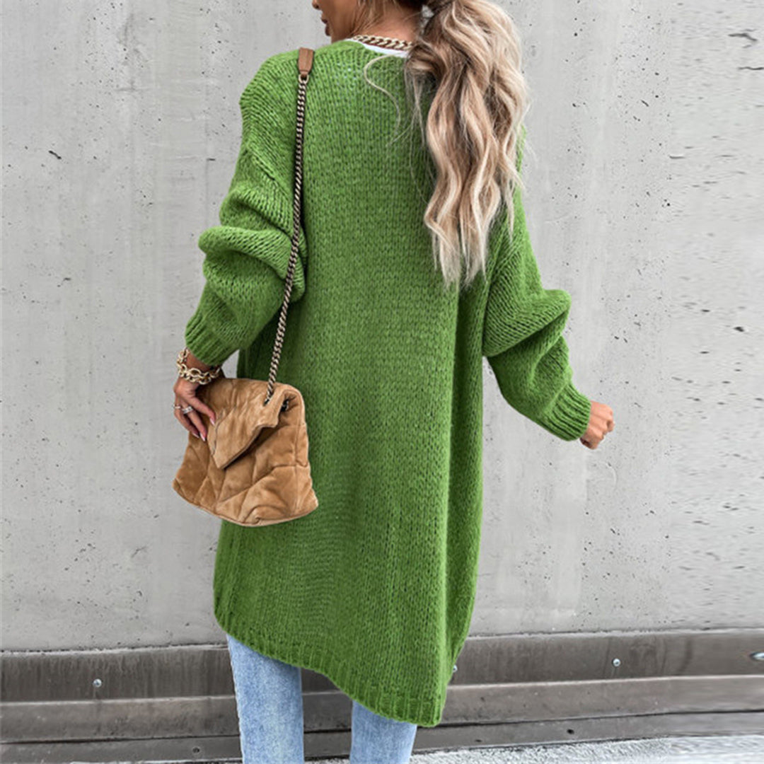 Women's versatile top, this classic knit cardigan offers casual elegance & warmth.