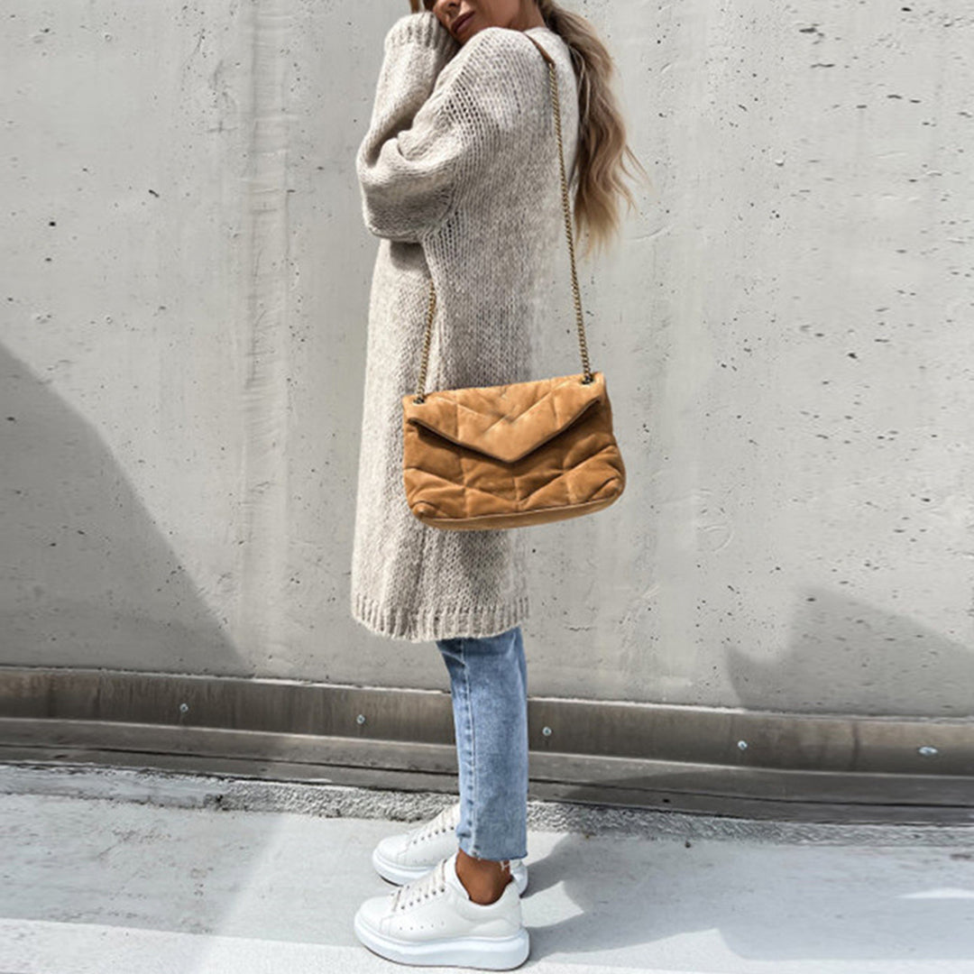 Elegant women's classic cardigan, cozy knit for stylish fall fashion & winter warmth.