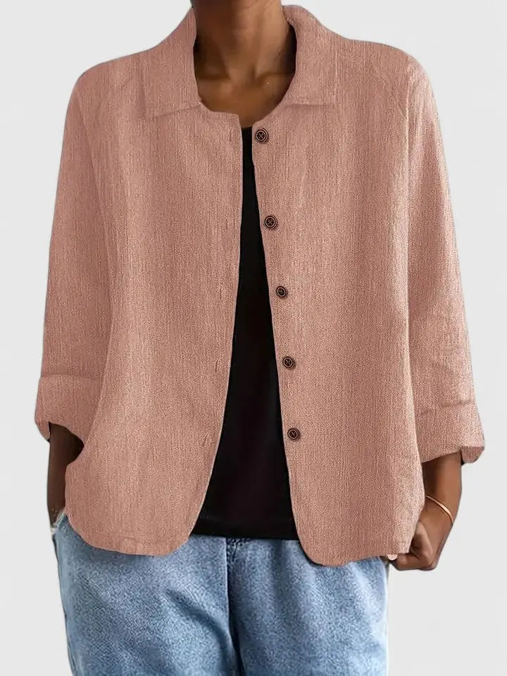 Casual women's light top with a relaxed fit, ideal for minimalist fashion and comfortable spring/summer wear.