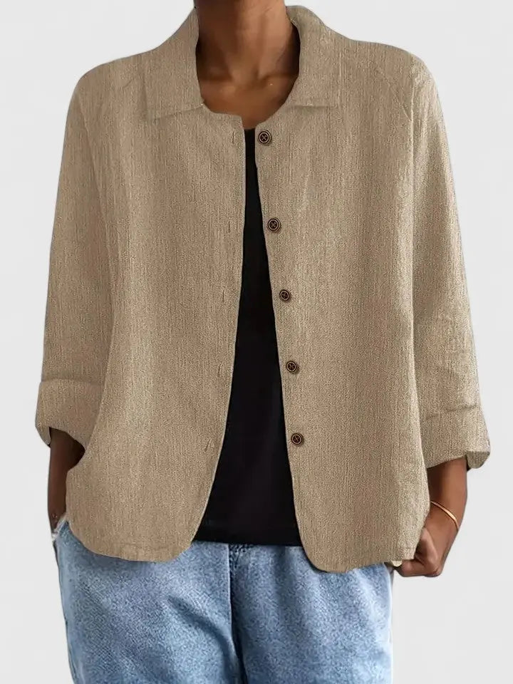 Comfortable classic women's light top for everyday wear. Simple style, soft fabric, and a versatile relaxed fit.