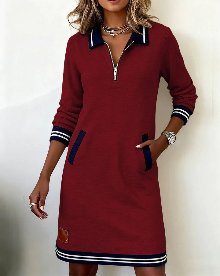 Comfortable long sleeve midi dress for women, classic style, soft fabric, and essential side pockets.