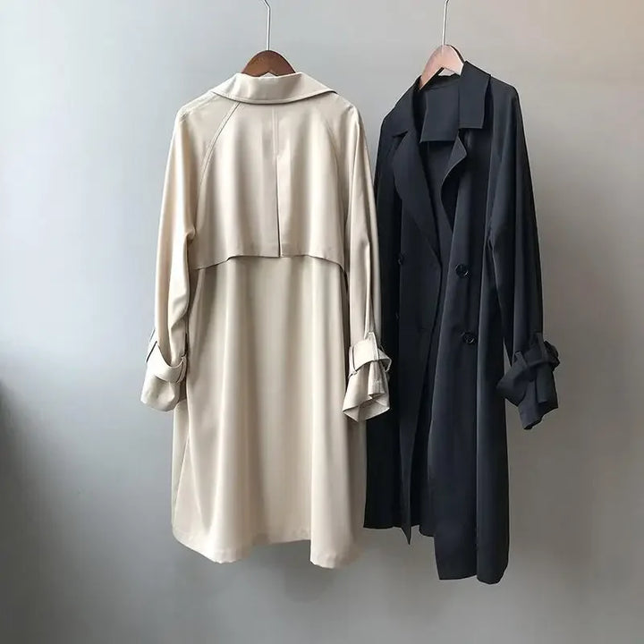 Stylish women's classic long trench coat, a sleek fit essential for versatile spring & fall elegant fashion.