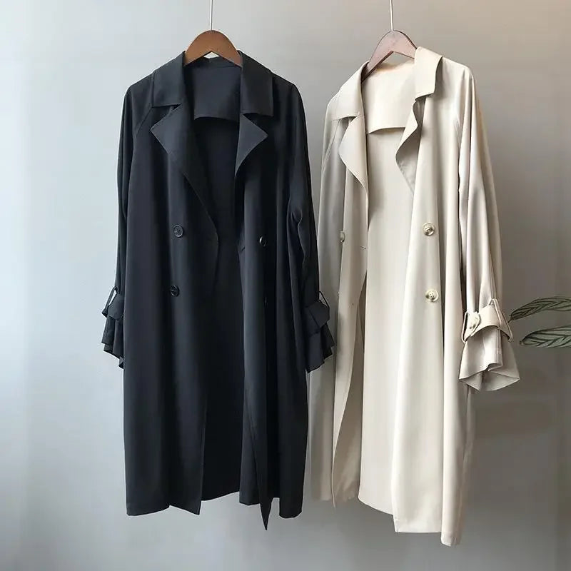 Women's sleek long trench coat, classic elegant outerwear perfect for spring, fall, and professional style.