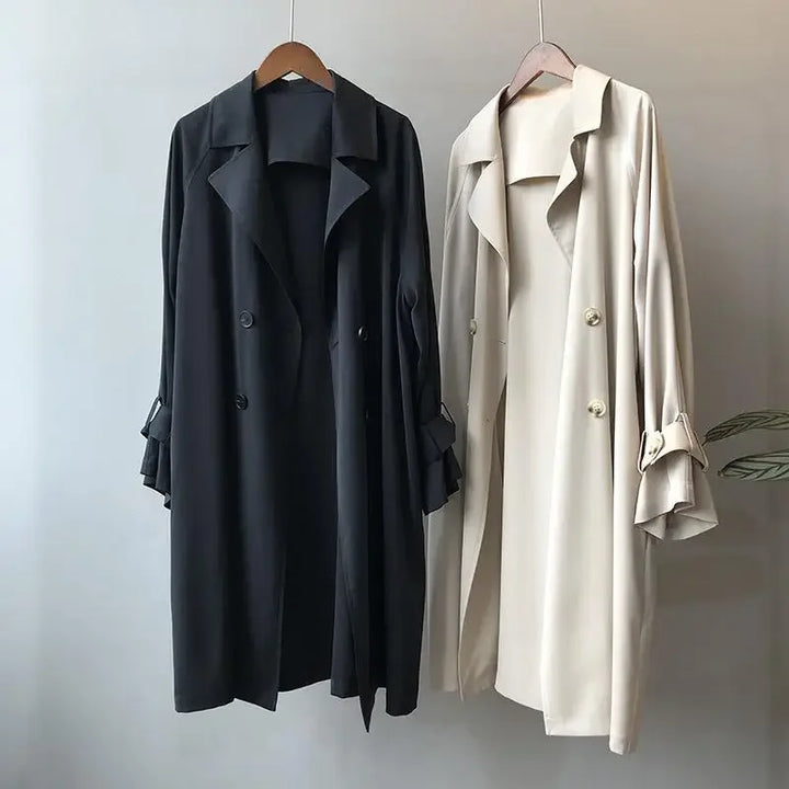 Women's sleek long trench coat, classic elegant outerwear perfect for spring, fall, and professional style.