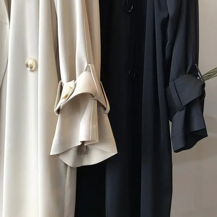 Versatile women's classic long trench jacket in beige, sleek fit for elegant spring & fall office wear.