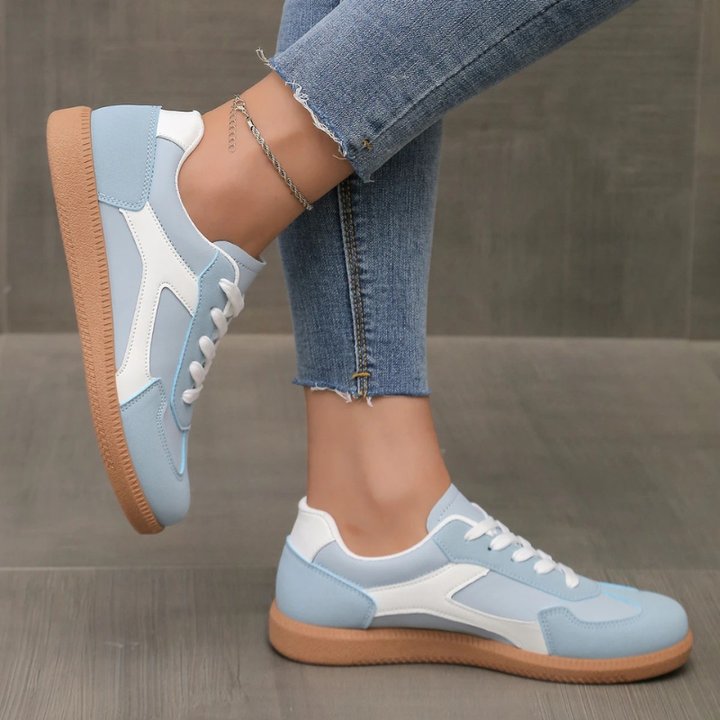 Blue classic low-top women's sneakers, ideal for comfortable street style & daily wear.