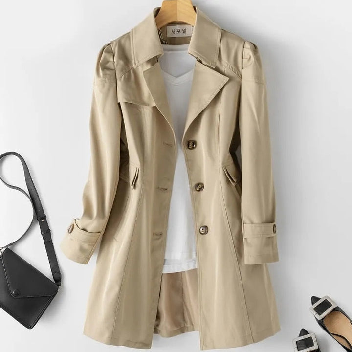 Women's elegant mid-length trench coat, a classic piece of outerwear perfect for spring and fall fashion.