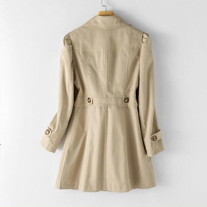 Classic mid-length trench coat for women. Elegant outerwear for spring & fall, a versatile ladies' jacket.