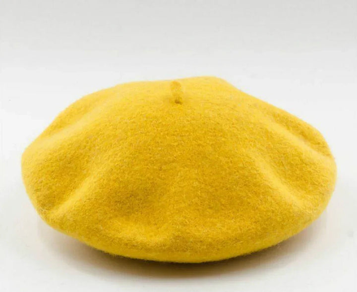 Blue wool beret, a classic and comfortable women's winter hat for daily wear.