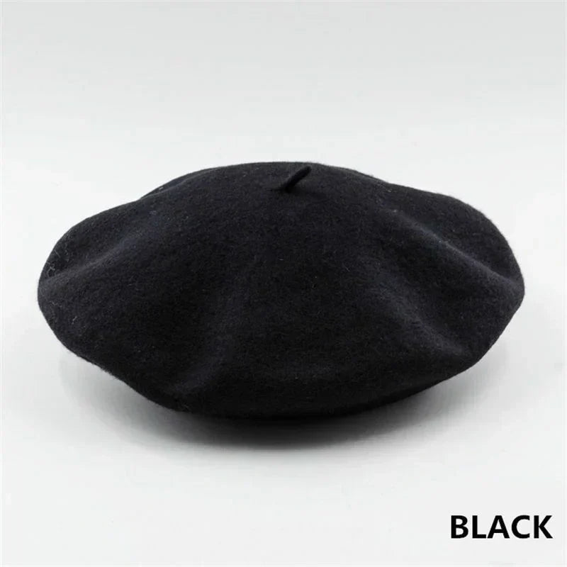 Elegant black wool beret, a warm and fashionable women's headwear for cold weather.