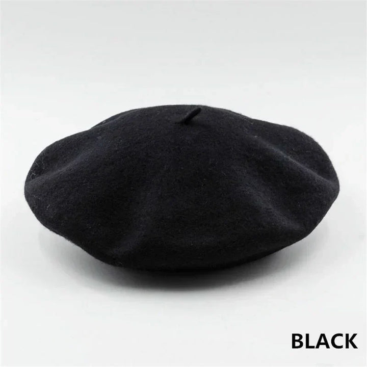 Elegant black wool beret, a warm and fashionable women's headwear for cold weather.
